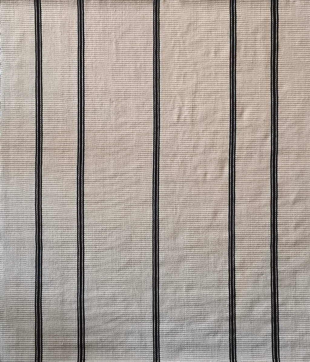 Alfombra diseño Indigo, confeccionada con material PET by Kaymanta, elaboración orgánica.